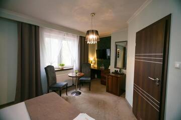 Фото номера Двухместный номер Делюкс с 1 кроватью и ванной Отель Hotel Onyx г. Губин 10